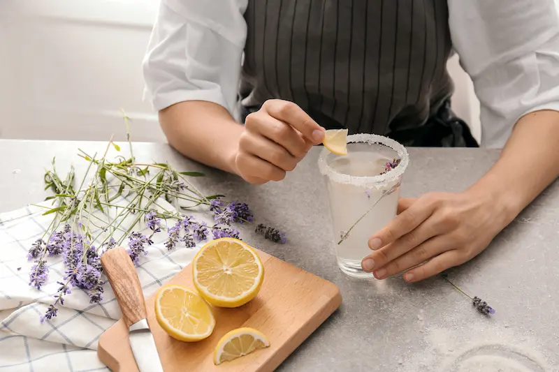 woman making lavender lemonade