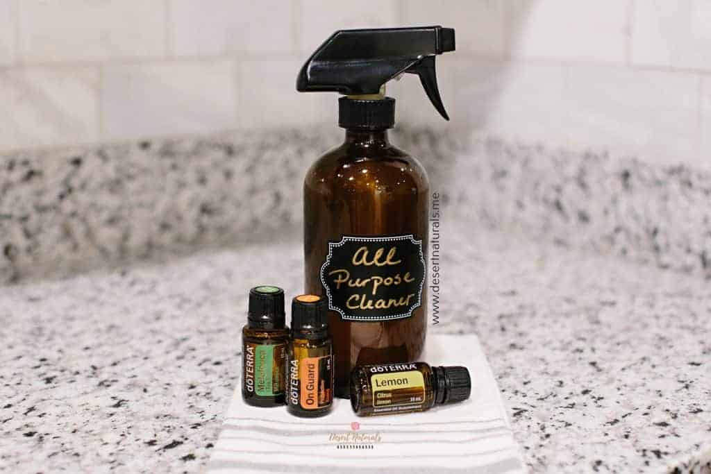 homemade cleaning spray with essential oils tea tree lemon on guard