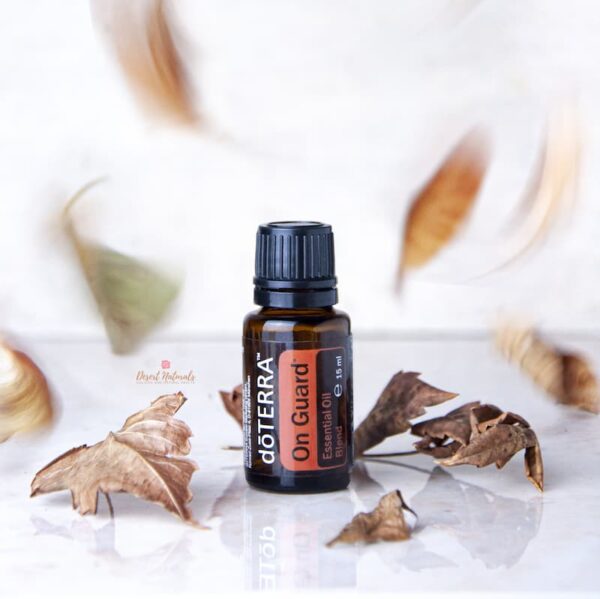 image of doterra on guard with falling autumn leaves