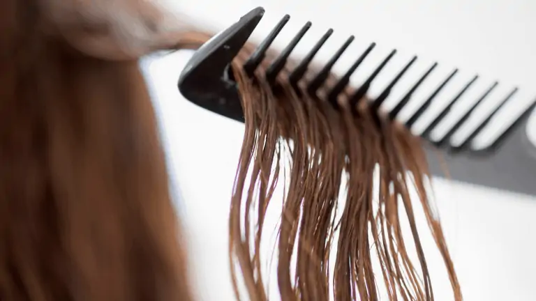 comb hair easily after washing with this homemade hair detangler with essential oils