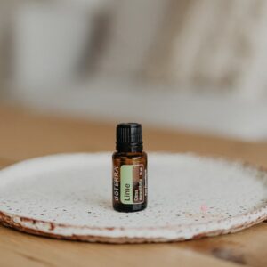 photo of doterra lime essential oil bottle on a tray