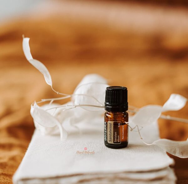 image of doterra sandalwood essential oil with flower