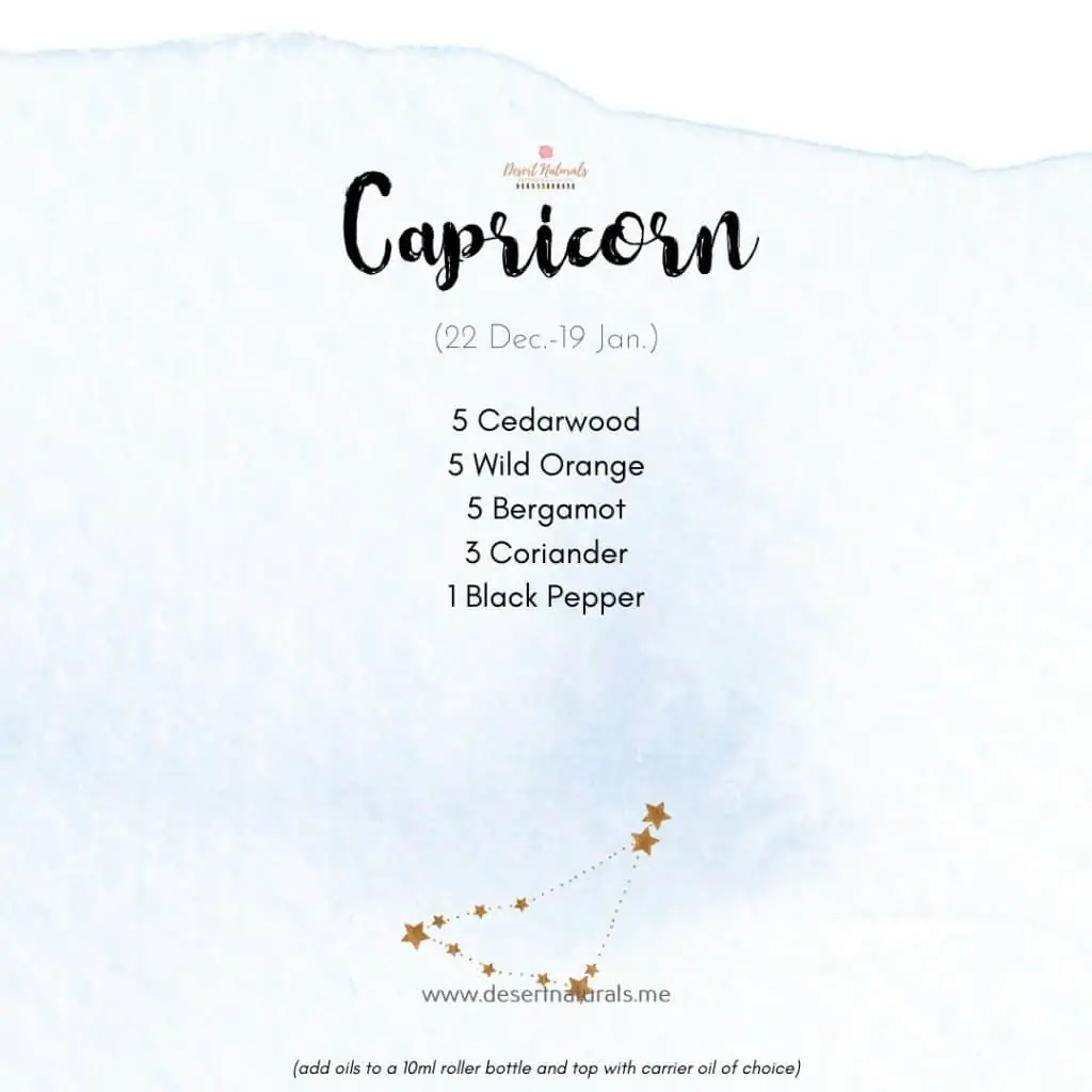 essential oil diffuser blend for Capricorn with star sign on a blue watercolor background