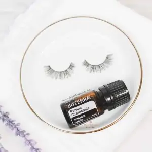image of doTERRA Roman Chamomile essential oil on a plate with sleeping eyes