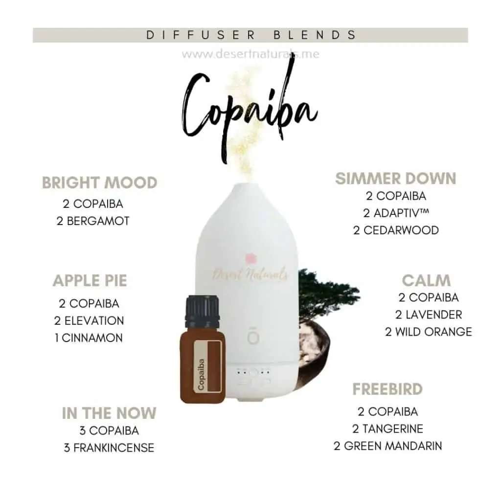 copaiba diffuser blends with the doterra laluz diffuser and a bottle of doterra copaiba essential oil