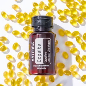 bottle of doTERRA Copaiba softgels surrounded by the capsules