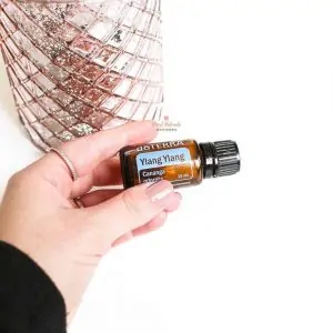 doTERRA Ylang Ylang with hand