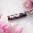 doterra magnolia essential oil roller with magnolia flowers