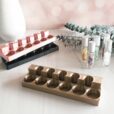 photo of 2 tier essential oil storage shelf with crystal rollers