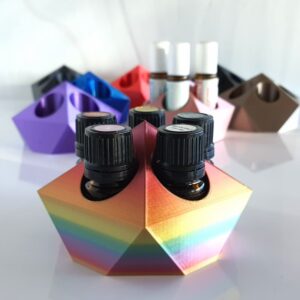 photo of rainbow small essential oil storage stand with other color oil holders in background