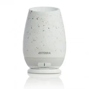 the doTERRA Roam essential oil diffuser is a portable diffuser with a charging dock