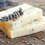 image of diy essential oil lotion bar with sprig of lavender
