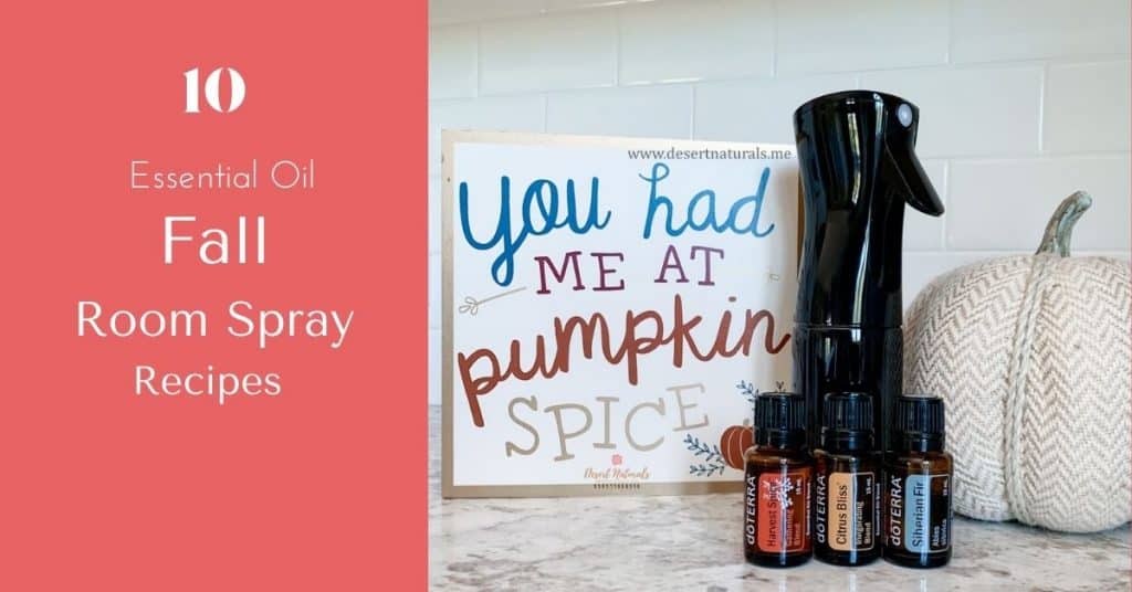 doterra essential oils and spray bottle with handmade sign saying you had me at pumpkin spice and text 10 essential oil fall room spray recipes