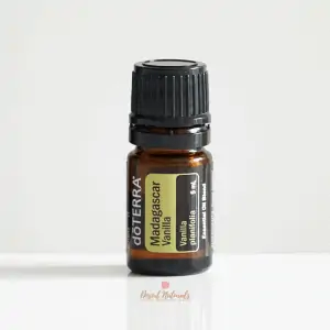 5ml bottle of doTERRA Vanilla essential oil on neutral background