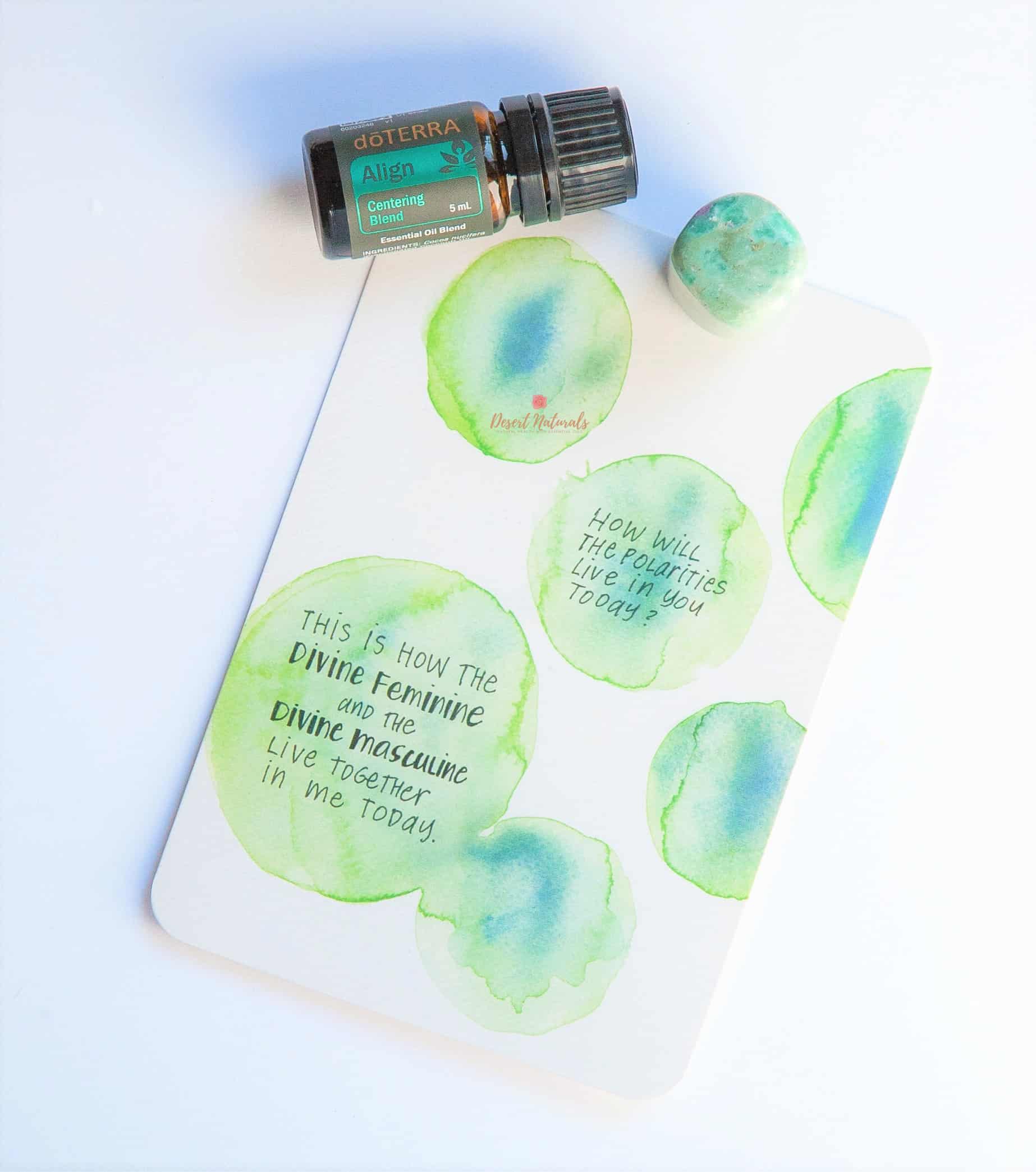 oracle card with bottle of doterra align essential oil yoga blend