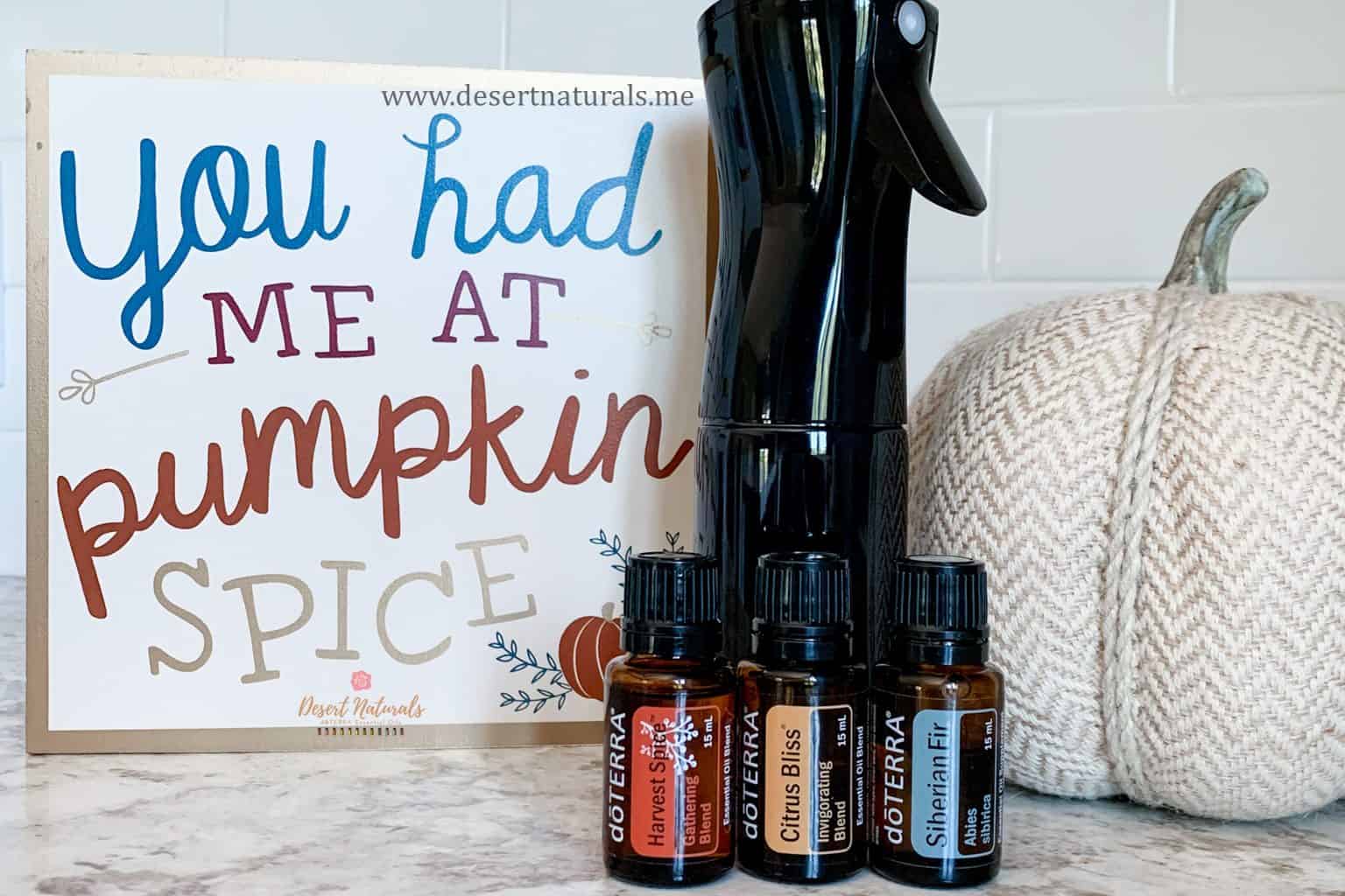 cute handmade sign with doterra essential oils and small black sprayer for an essential oil room spray