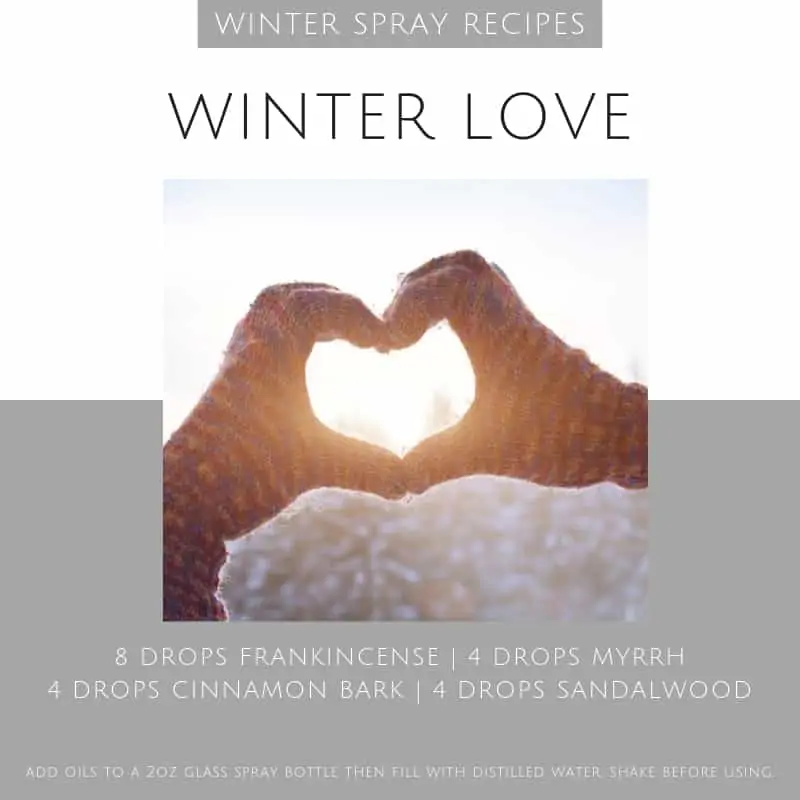 woman's hands making a heart shape with winter love essential oil spray recipe