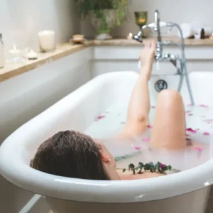 woman in a bathtub taking a detox bath