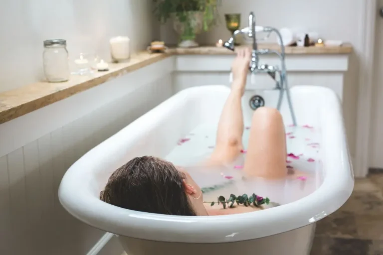 woman in a bathtub taking a detox bath