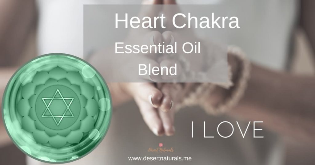 heart chakra symbol and essential oil text