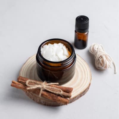 candle making supplies with essential oil bottle