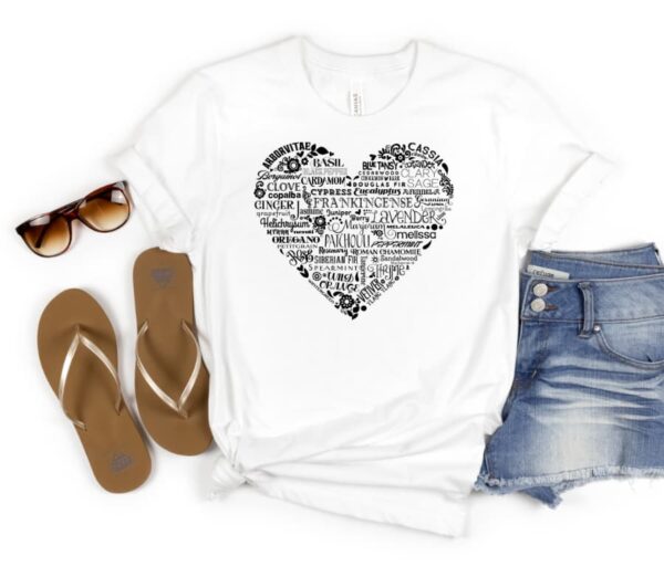 mockup of the white tshirt with essential oil word art in a heart shape