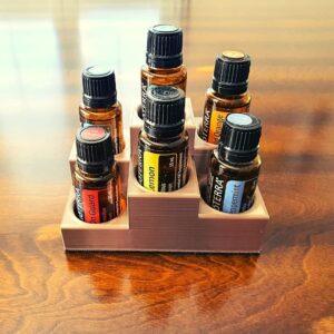 image of essential oil display stand with doTERRA bottles