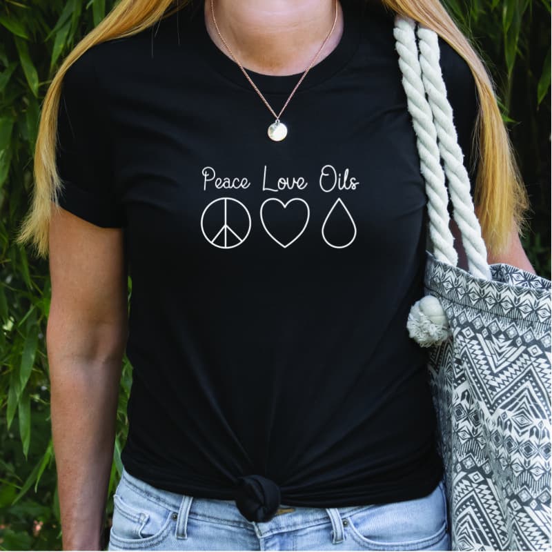 peace love oils essential oil black t shirt on woman