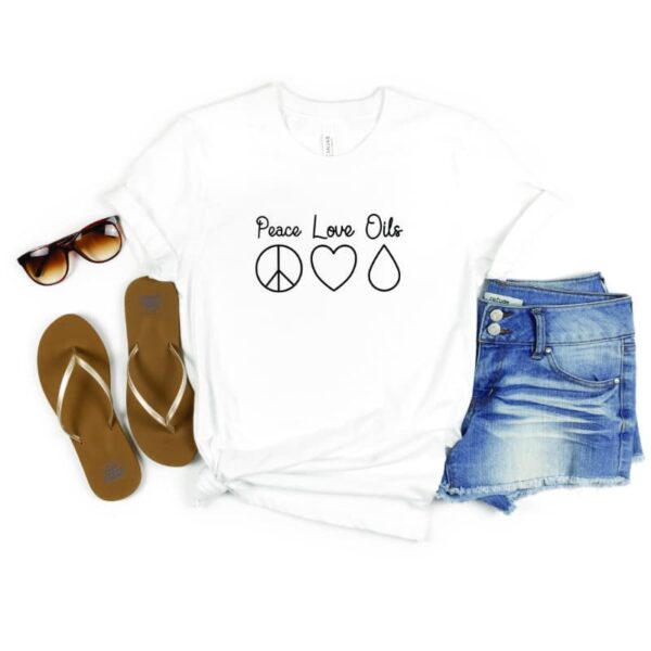peace love oils shirt flatlay mockup with shorts and flipflops