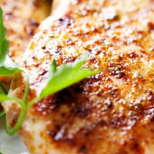 grilled chicken with parsley garnish