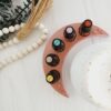 rose gold colored 3d printed moon essential oil holder with wood beads and eucalyptus