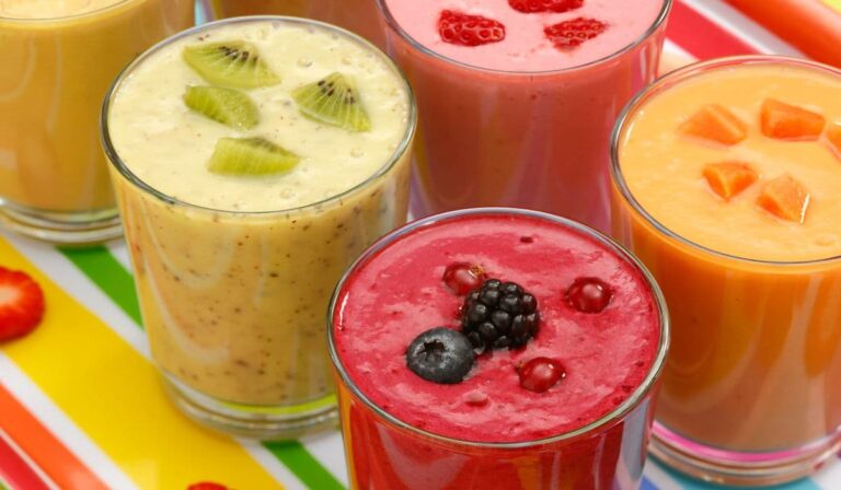 brightly colored essential oil fruit smoothies