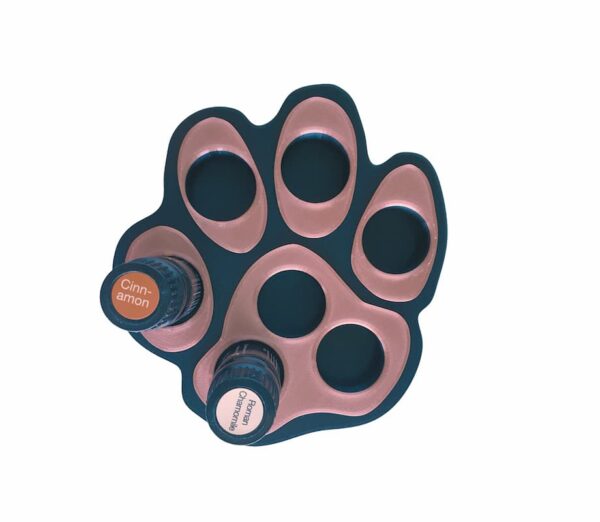 dog paw kids essential oil holder with bottles of doterra oil