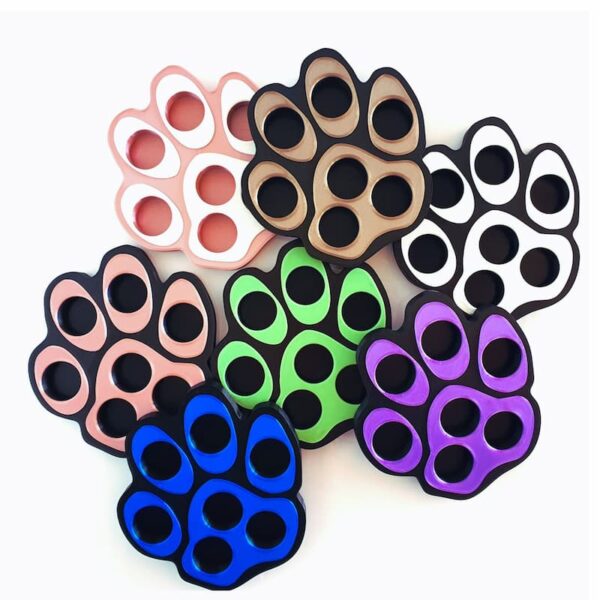 white background with multiple color essential oil holder in a dog paw shape