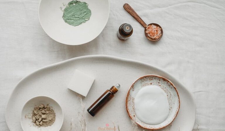 essential oil rollerballs and bowls of homemade skin care