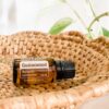 image of doterra guaiacwood essential oil bottle on a basket