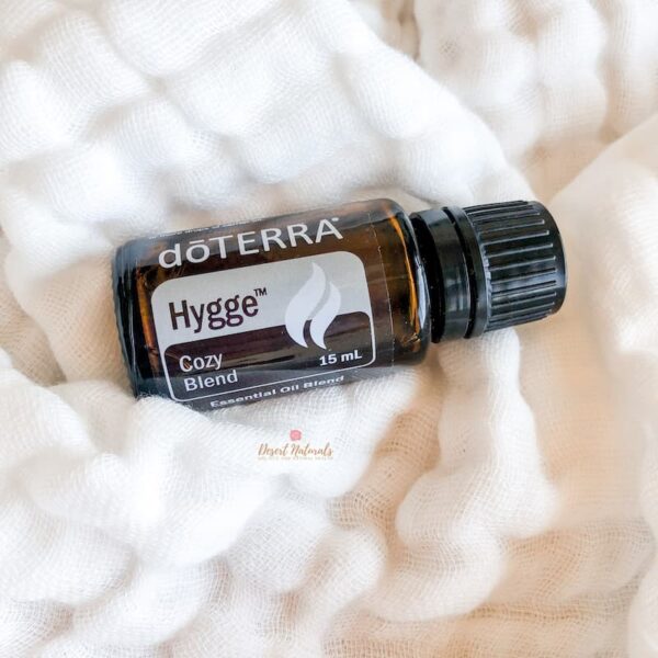photo of doTERRA hygge essential oil blend on white blanket