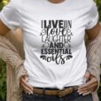 woman wearing essential oil shirt with text that says I live on love laughter and essential oils