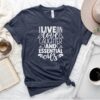 image of navy heather tshirt with text I live on love laughter and essential oils