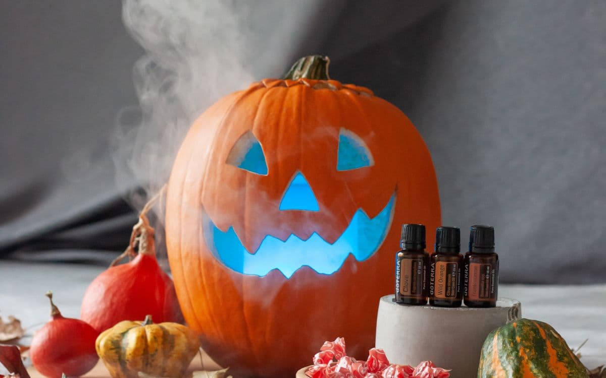 image of pumpkin with diffuser inside it and doterra essential oils