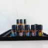 white background with side view photo of essential oil storage display with doTERRA bottles and rollers in it