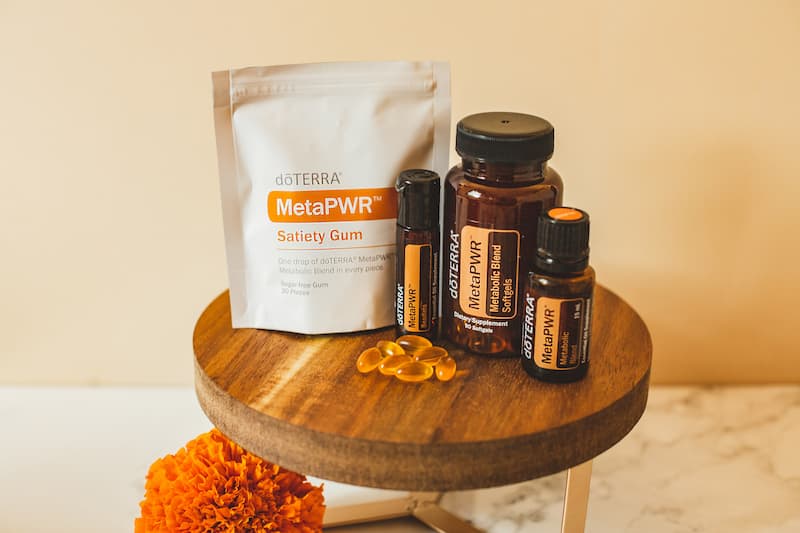 the doterra metapwr system products step 1 on a stool