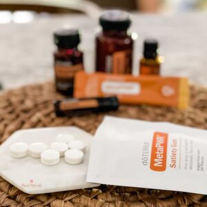image of doTERRA MetaPWR gum with other metaPWR products in the background