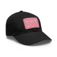 black baseball hat with peace love oils on a pink patch