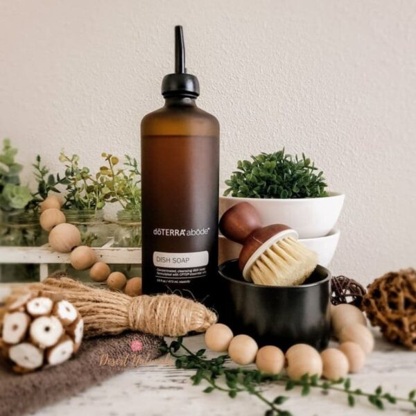 farmhouse style photo of doterra abode dish soap and bubble scrubber
