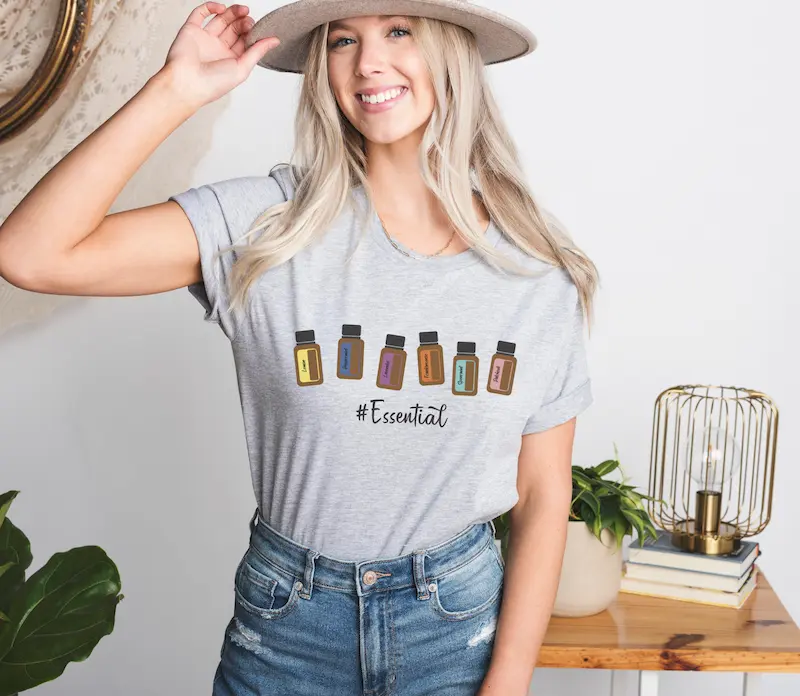 doterra essential oil bottle tshirt mockup grey woman modeling doterra essential oil bottle tee