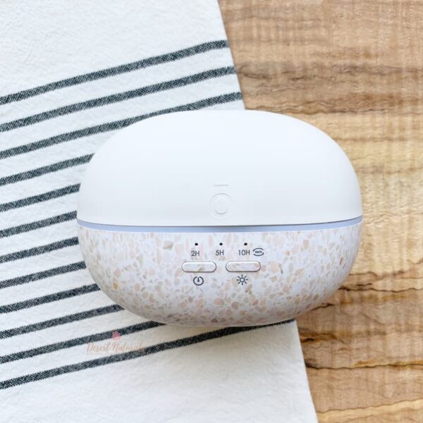 image of doTERRA pebble diffuser on countertop with kitchen towel