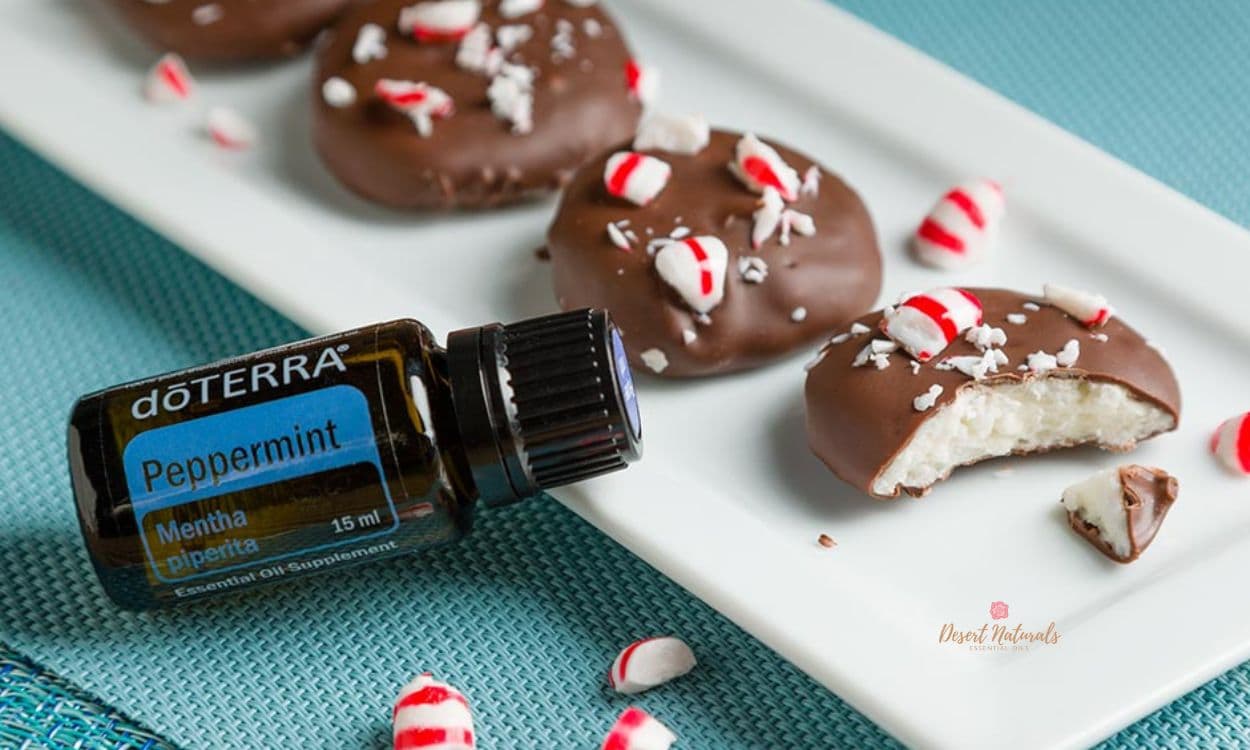 photo of doTERRA Peppermint essential oil with homemade peppermint chocolates with crushed candy canes