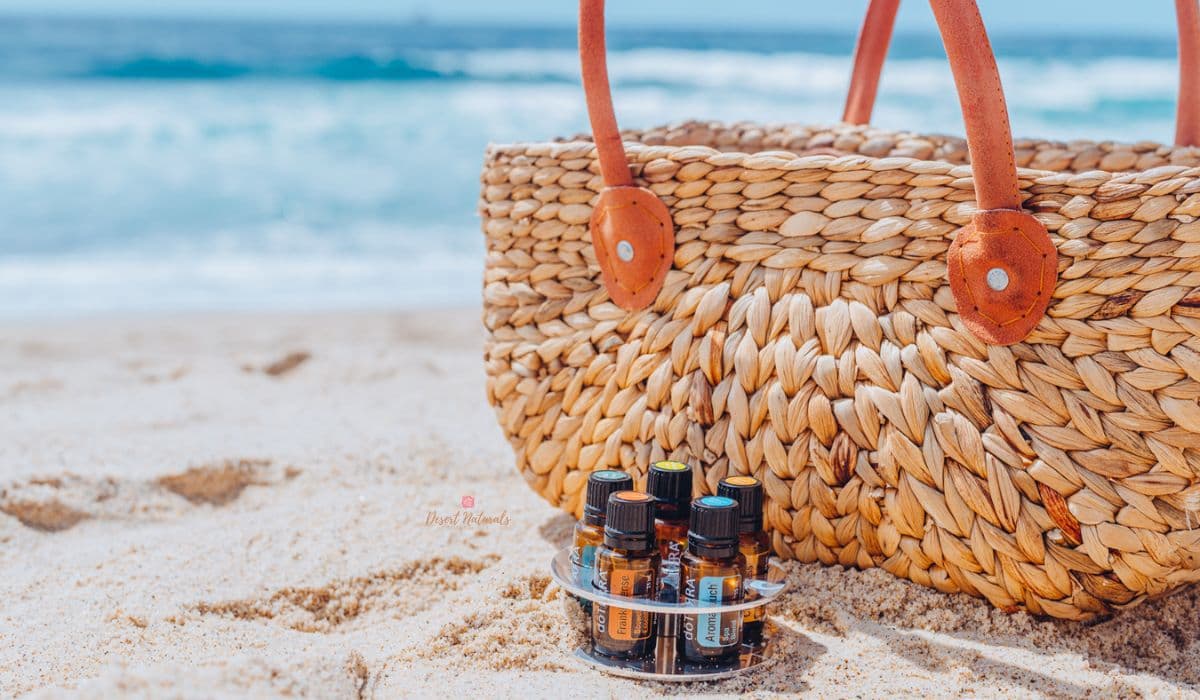 basket and doterra essential oils for the diffuser on beach in the summer