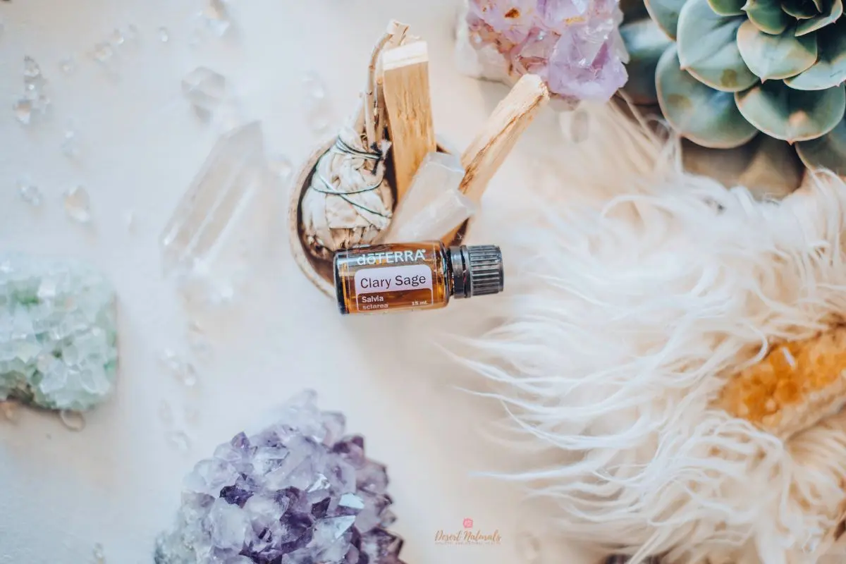 image of doTERRA Clary Sage essential oil with crystals for benefits and uses